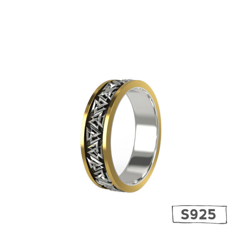 Two-tone ring with intricate design on a white background, featuring 'S925' stamp.