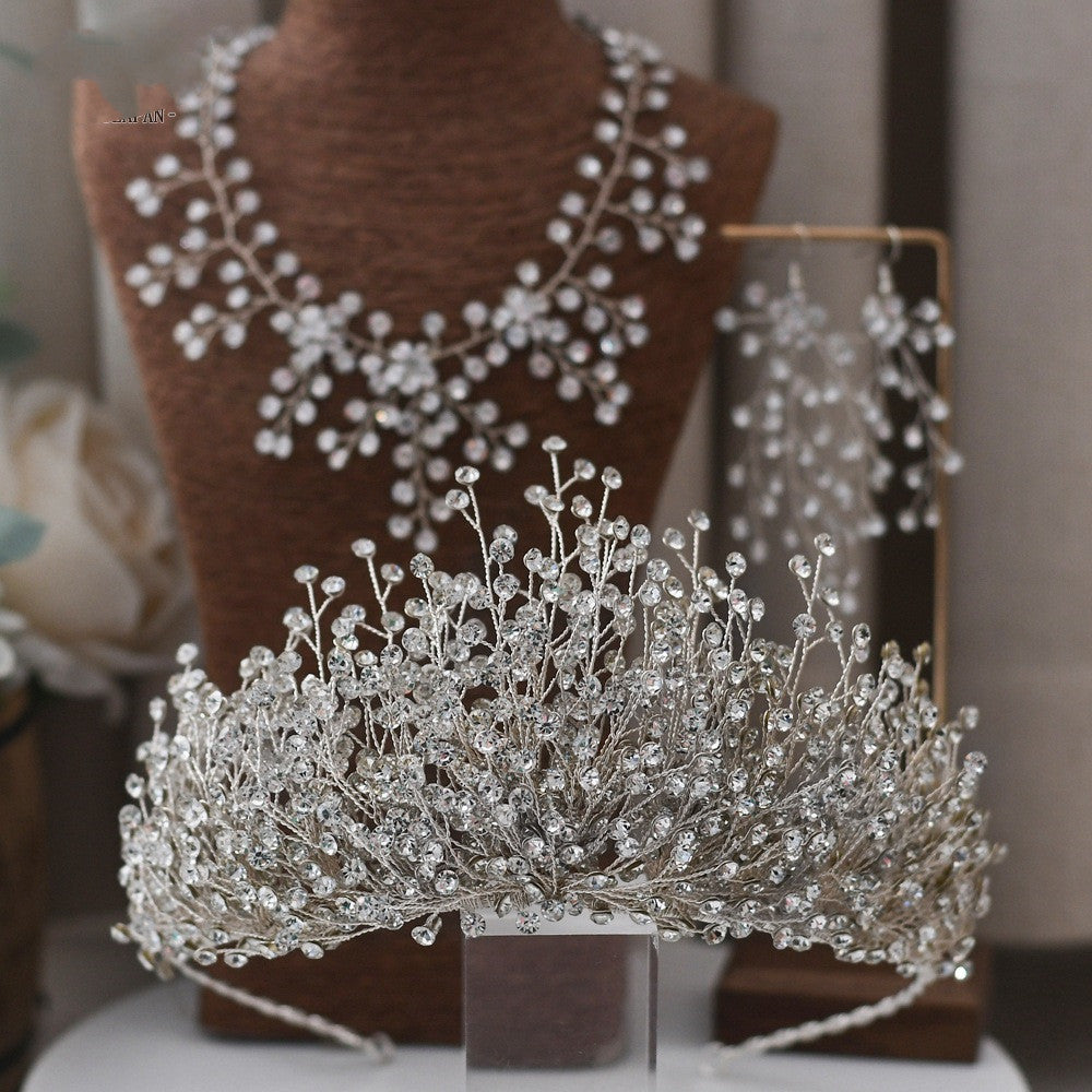 Silver tiara with crystal embellishments on a mannequin head