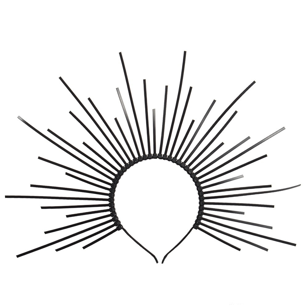 Black and white line drawing of a sunburst pattern