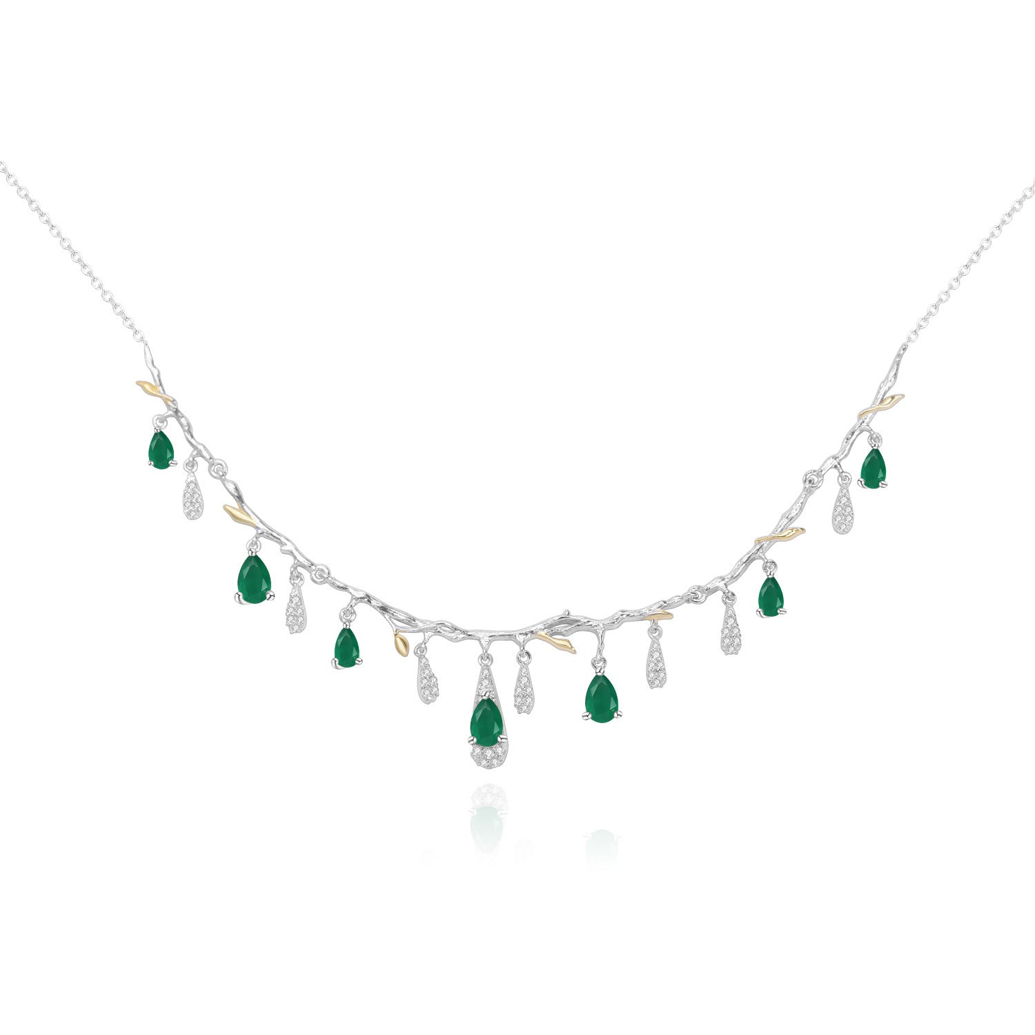 Necklace with emerald and diamond drops on a white background
