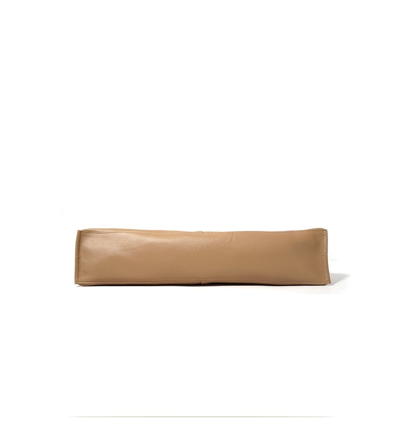 Tan leather wallet on a white background
