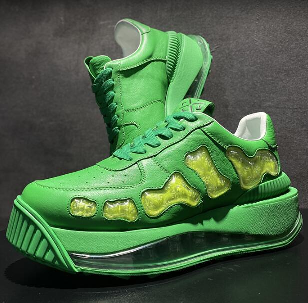 Green sneakers with unique design on a black background