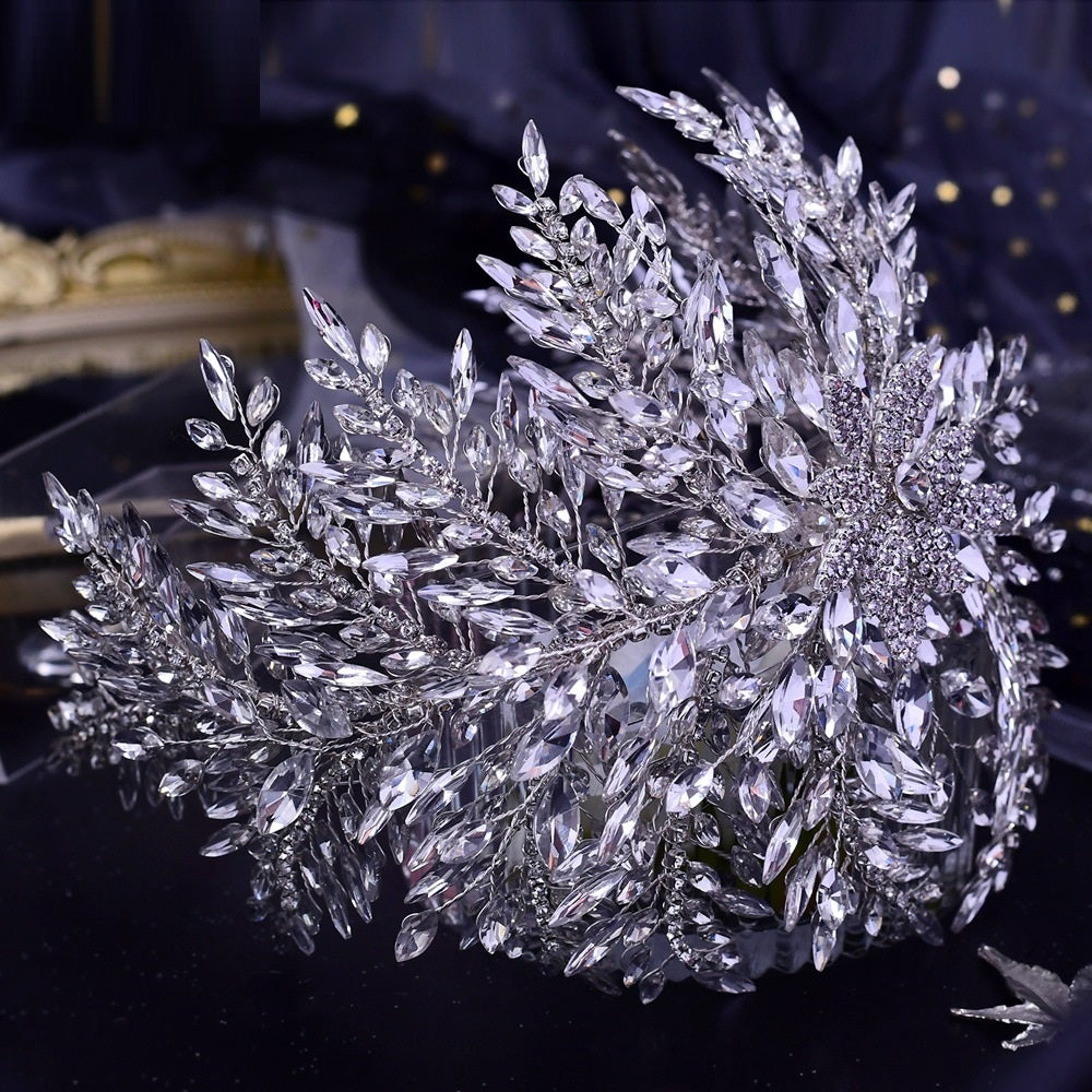 Close-up of a decorative crystal headpiece on a dark background