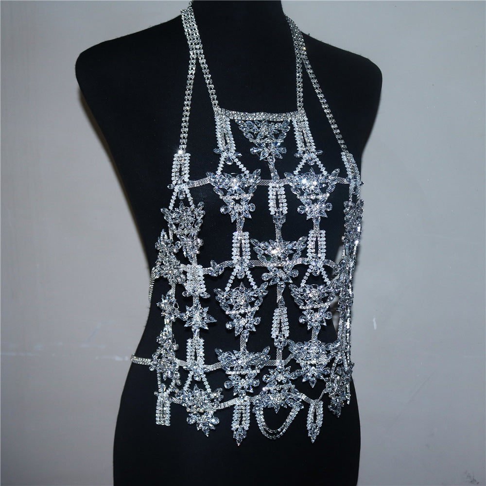 Silver beaded halter top on a mannequin against a gray background