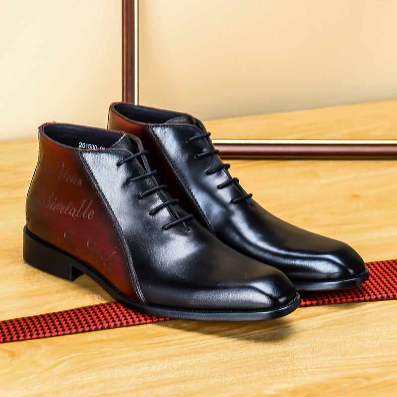 Pair of black leather dress shoes on a wooden surface with a red and gold mat.