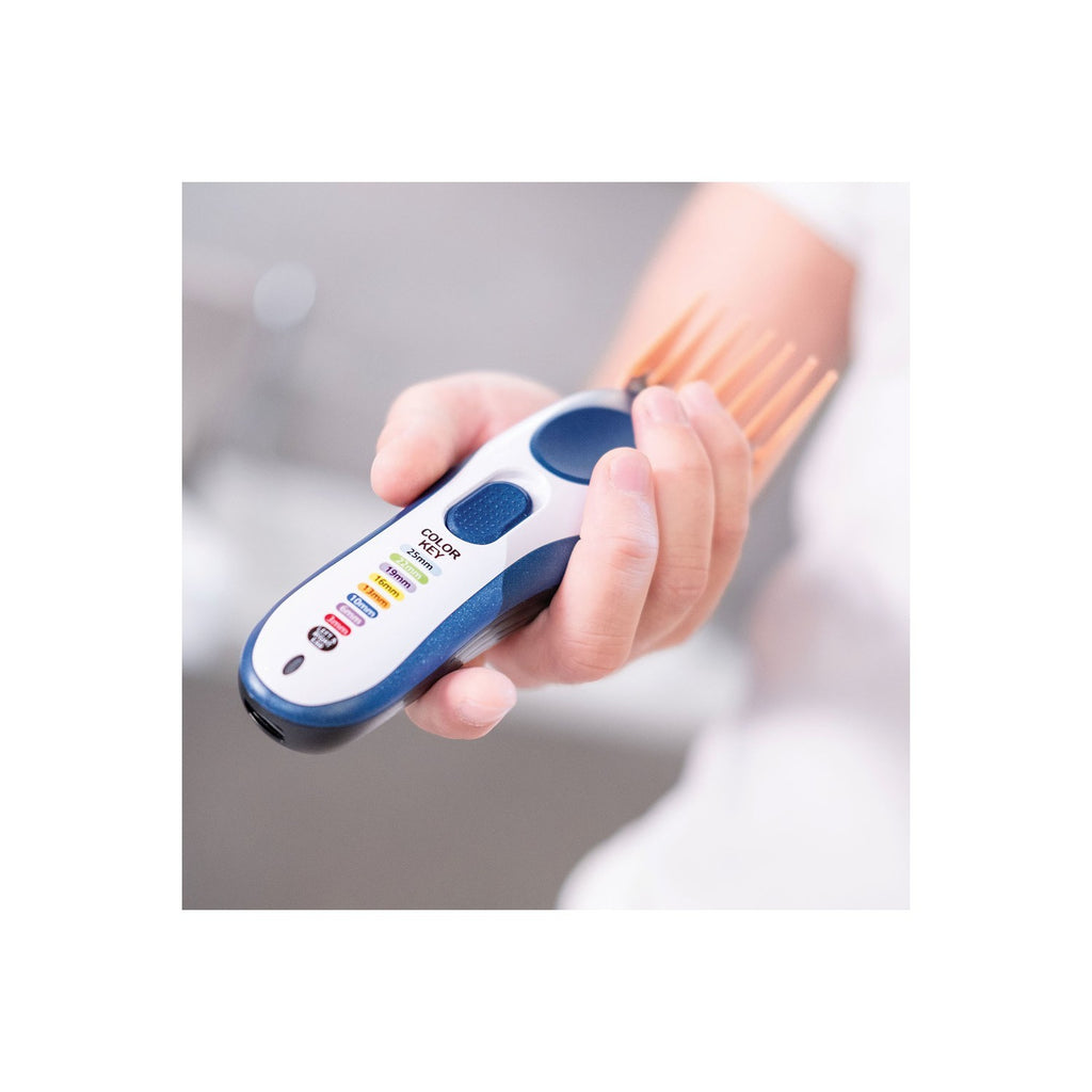 Hand holding a digital device with a blurred background