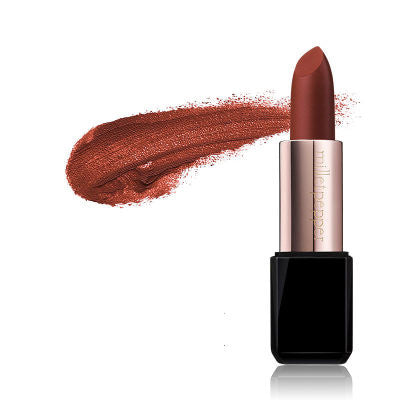 Lipstick with a swatch of color on a white background