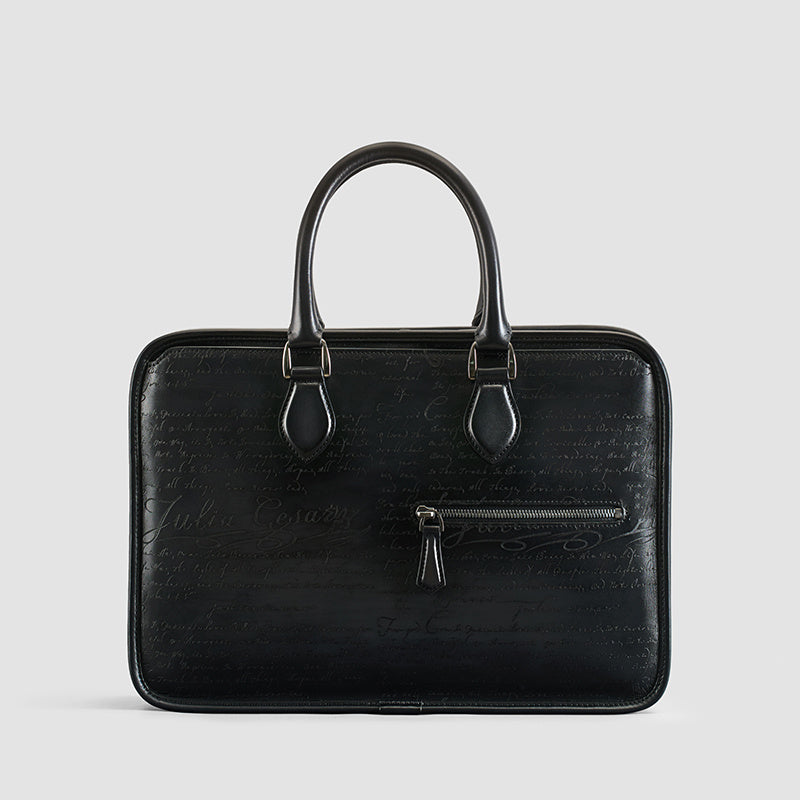 Black leather briefcase with a zipper on a light gray background