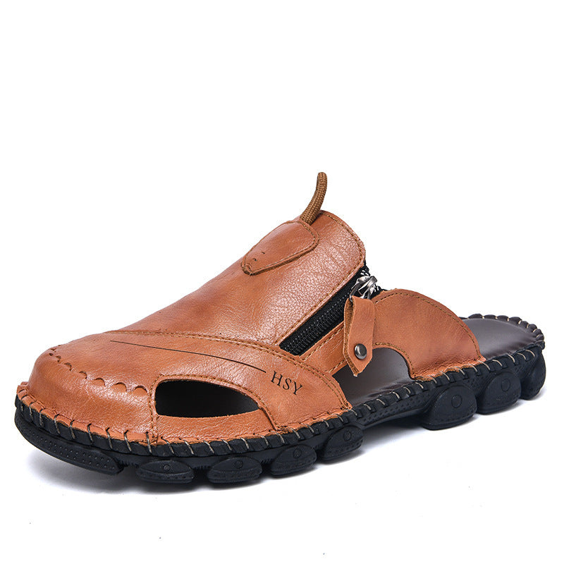 Brown sandal with black sole on a white background