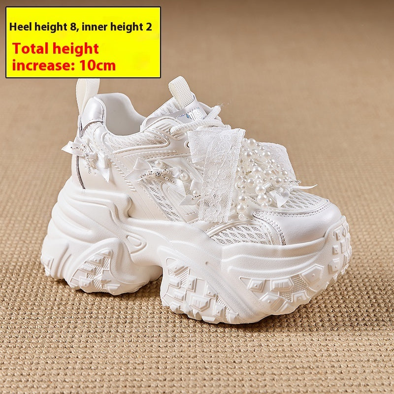 White sneaker with thick sole on a beige background, showing heel height and total height increase.