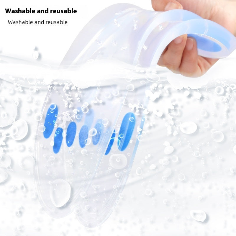 Hand holding a washable and reusable product with water droplets on a white background
