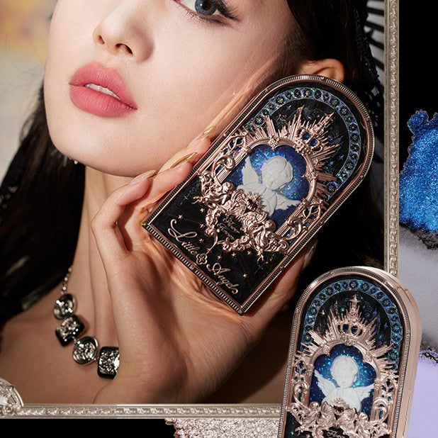 Close-up of a woman wearing an ornate earring with intricate design and gemstones.