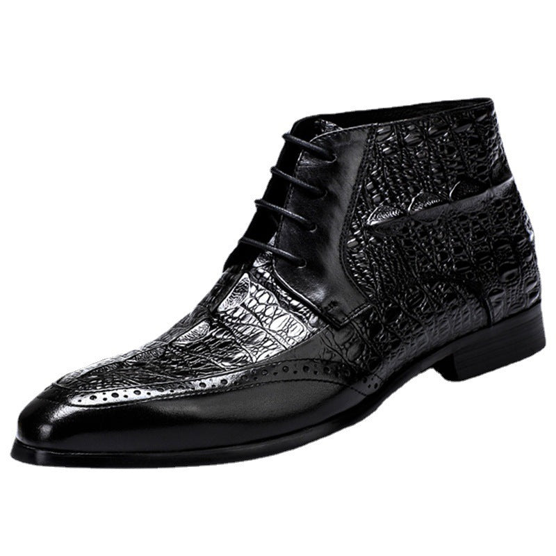 Black leather dress shoe with crocodile texture on a white background