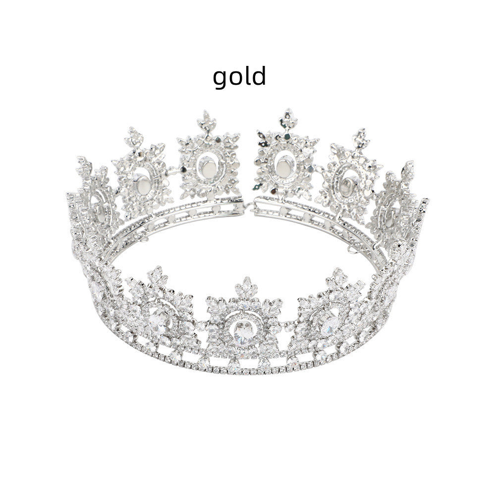 Gold tiara on a white background