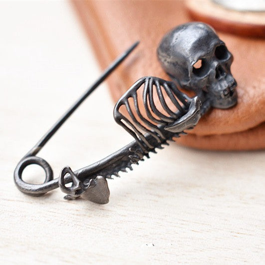 Skeleton design bottle opener on a white surface