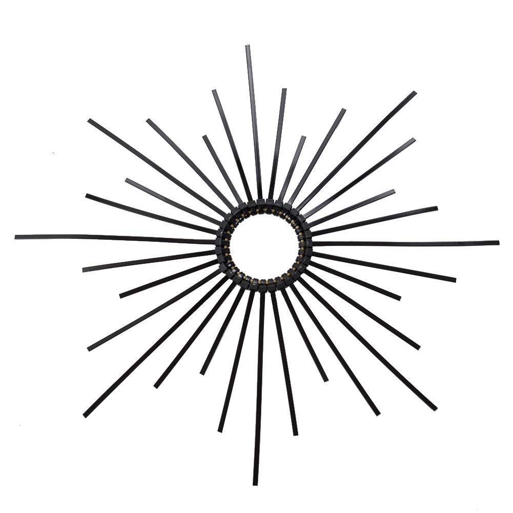 Decorative wall art with sunburst design on a white background