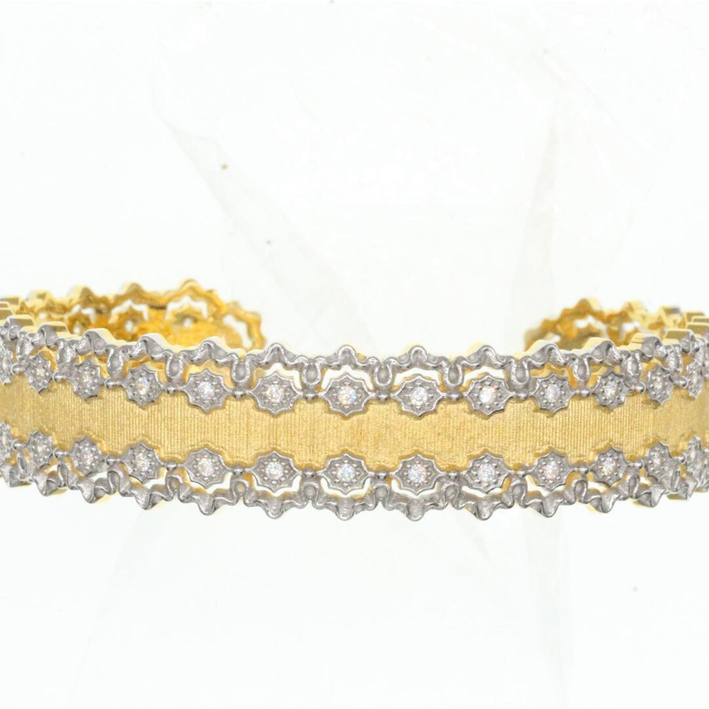 Gold and silver choker necklace on a white background