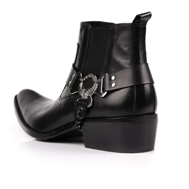 Black leather boot with a decorative buckle on a white background