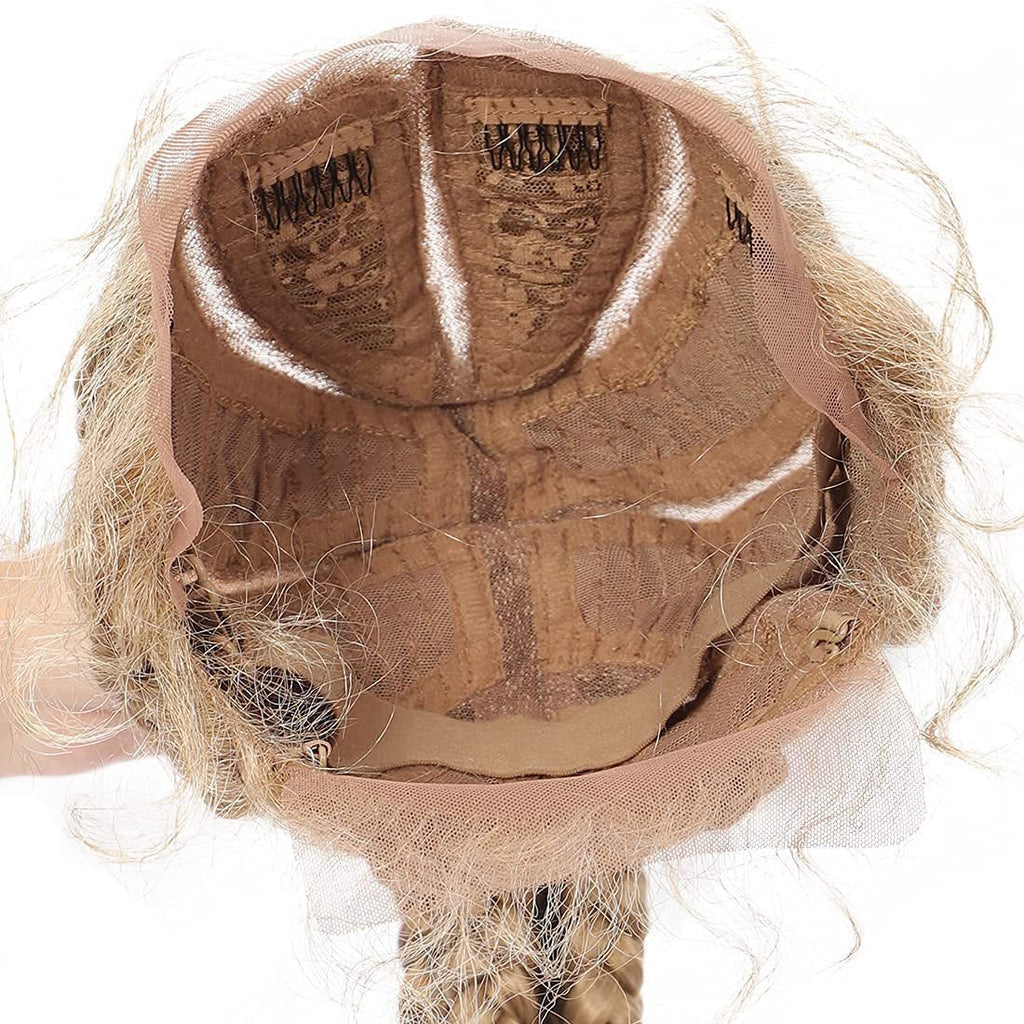 Close-up of a wig cap with hair strands on a white background