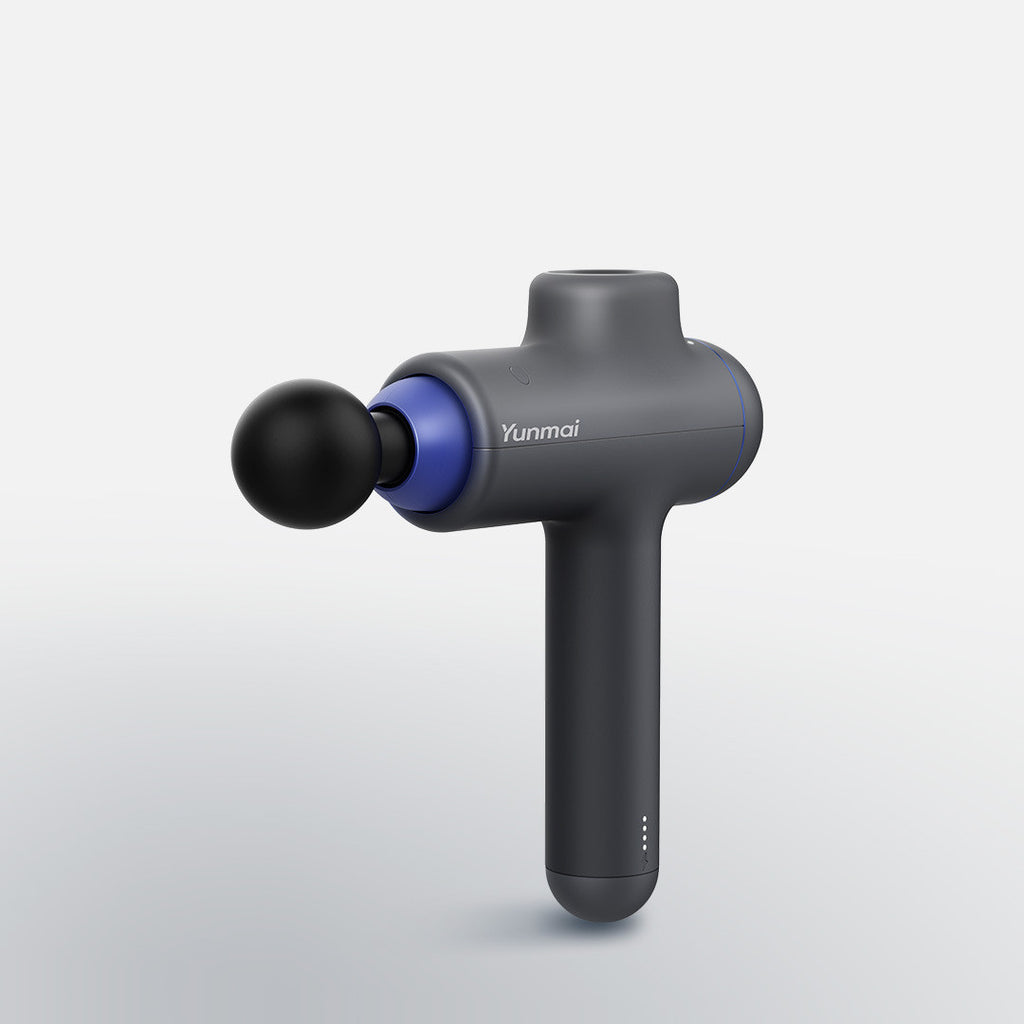 Massage gun with black and blue design on a light gray background