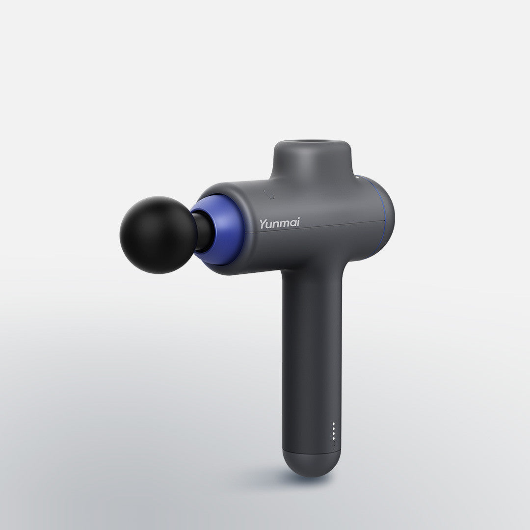 Massage gun with black and blue design on a light gray background