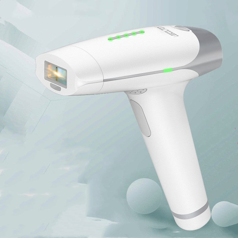 White and gray laser hair removal device on a light blue background