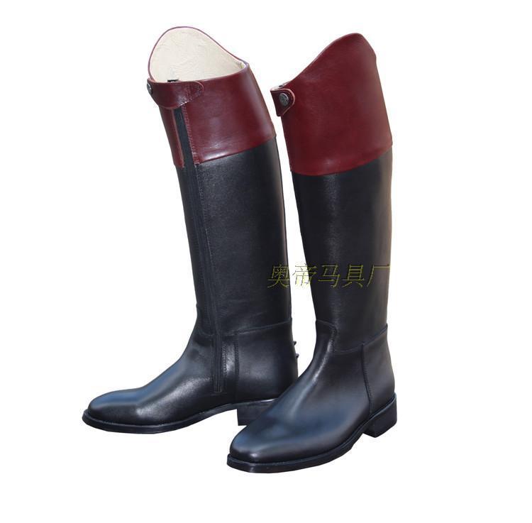 Black and red riding boots on a white background
