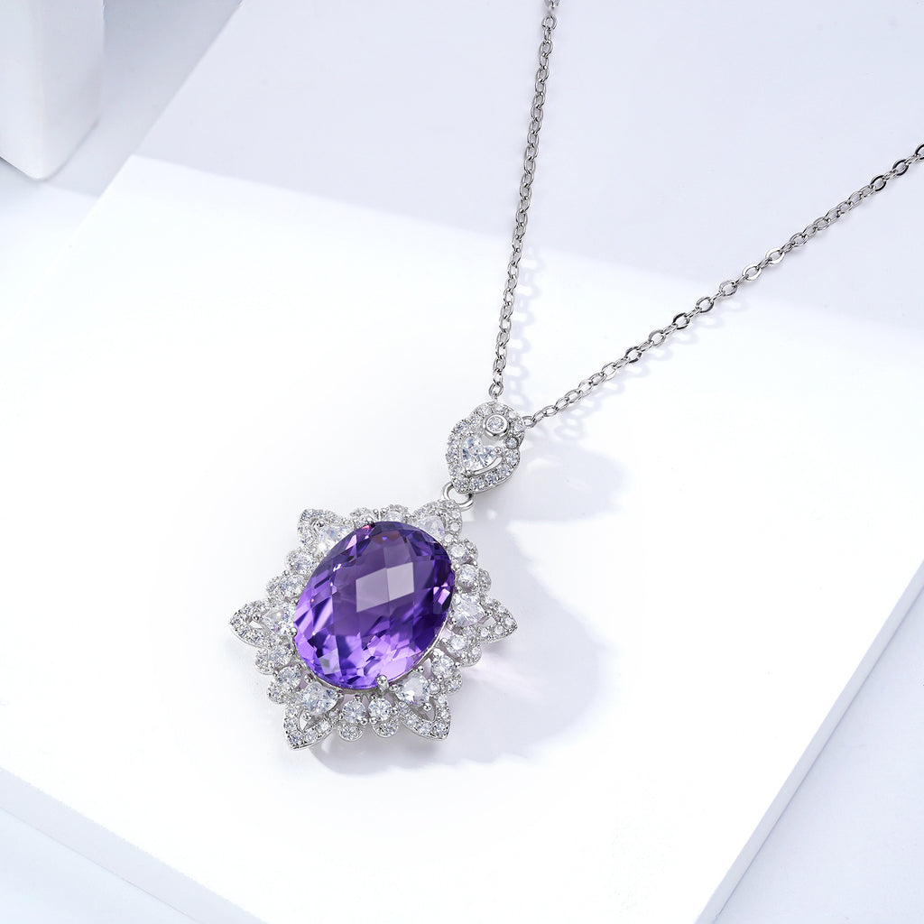 Purple gemstone necklace on a white background