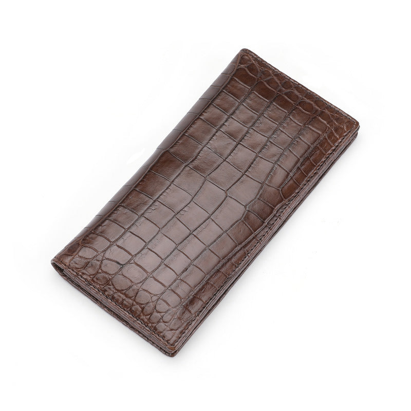 Brown crocodile-patterned wallet on a white background