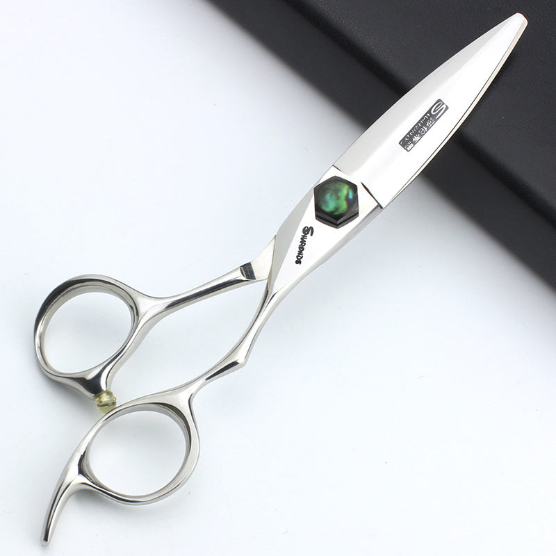 Silver scissors with a brand logo on a white background