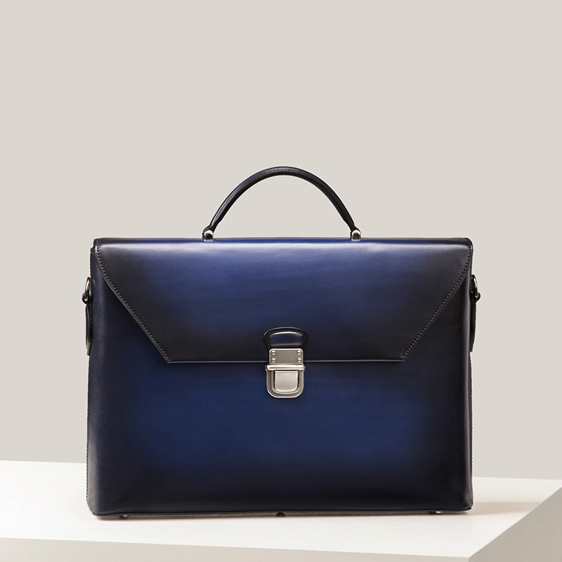 Blue leather briefcase on a light gray background