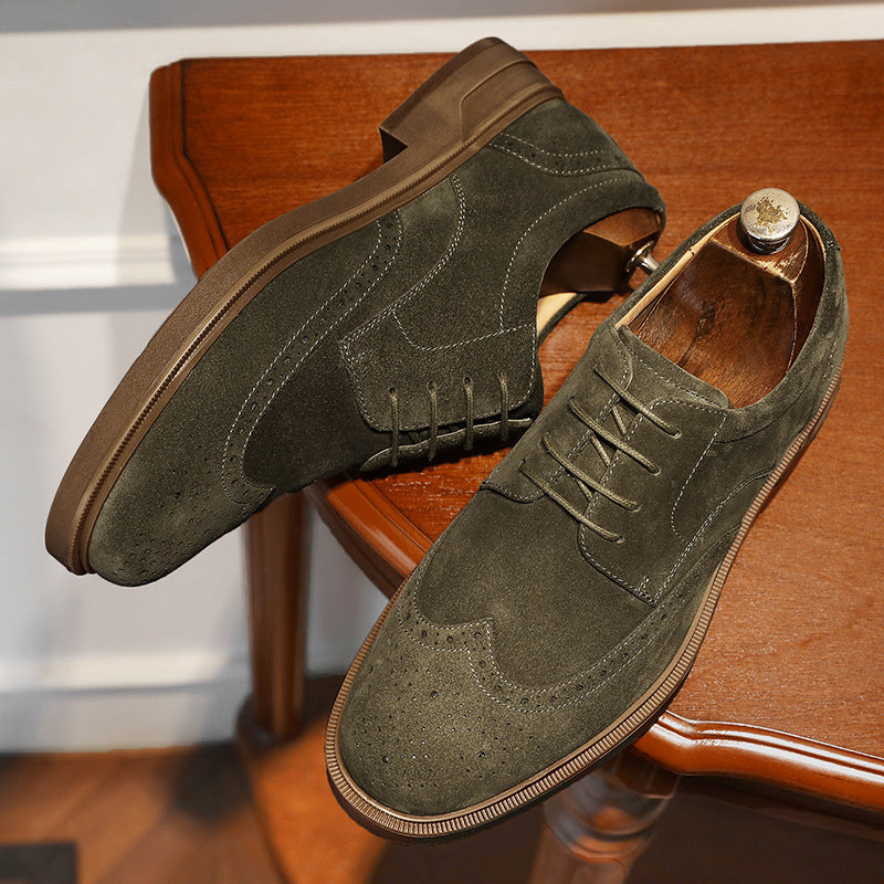 Green suede shoes on a wooden chair