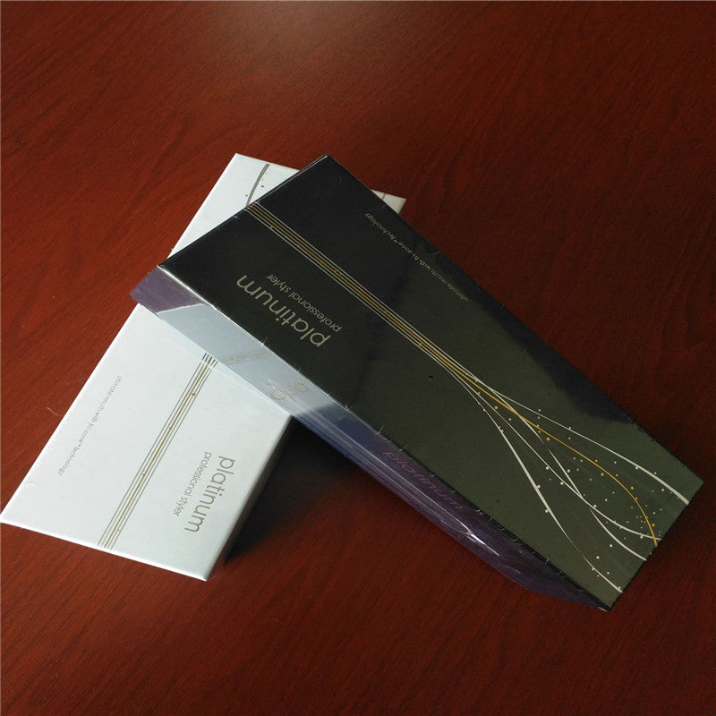 Packaging with 'Platinum' branding on a wooden surface