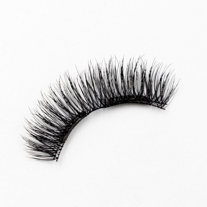 Pair of false eyelashes on a white background