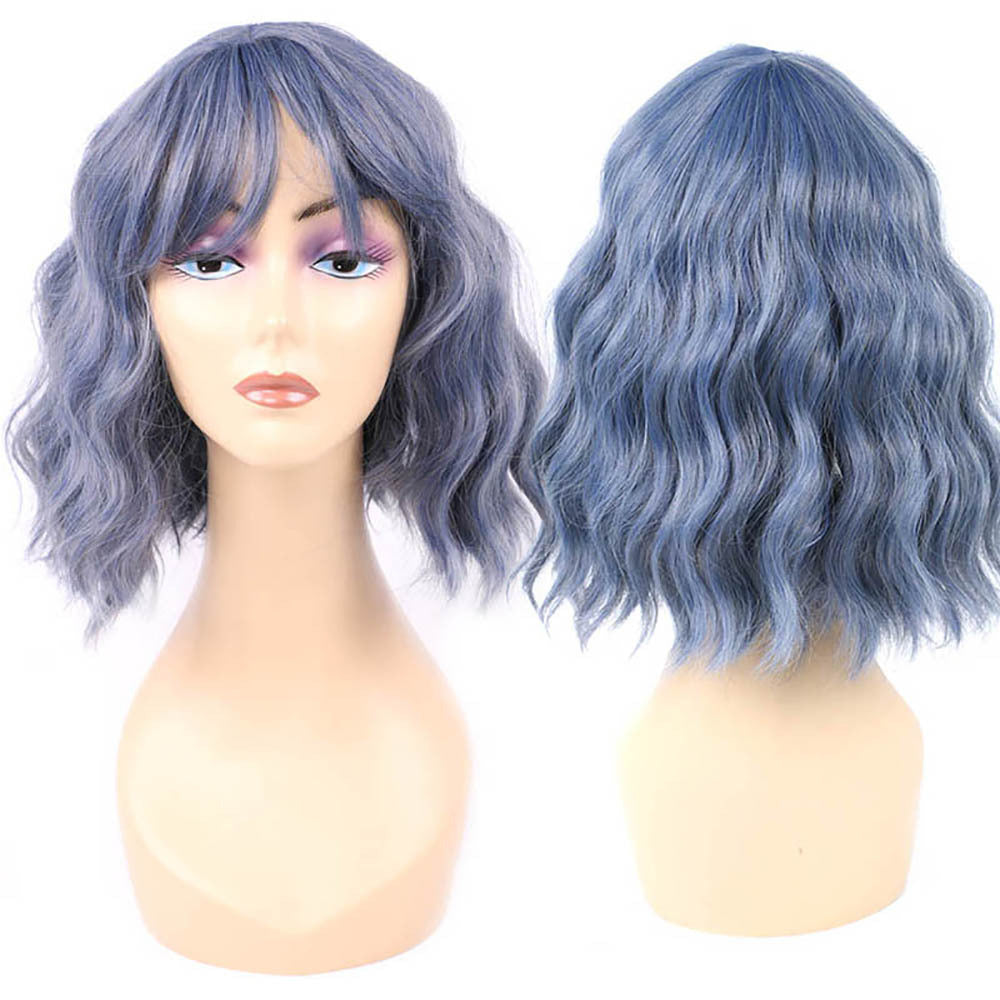 Blue wavy wig on a mannequin head with a plain background