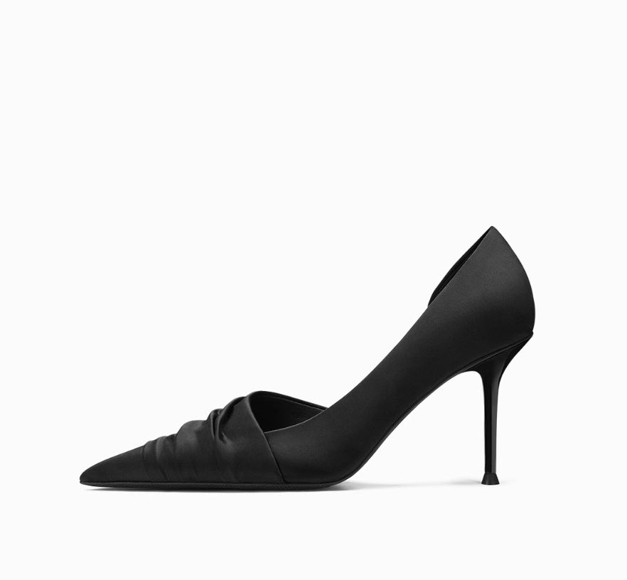 Black high-heeled shoe on a white background