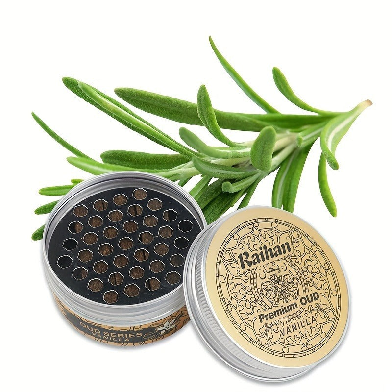 Container of premium oud with vanilla scent, surrounded by green leaves on a white background