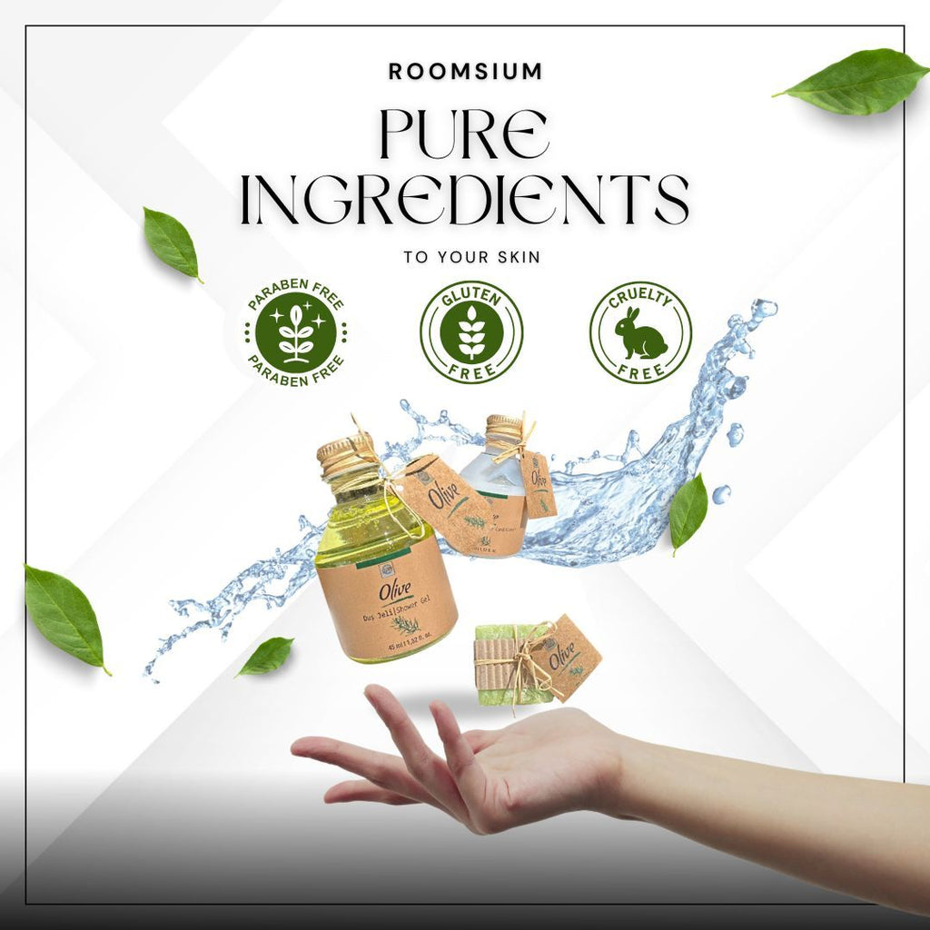 Advertisement for Roomsium pure ingredients with product bottles, a hand, and green leaves on a white background.