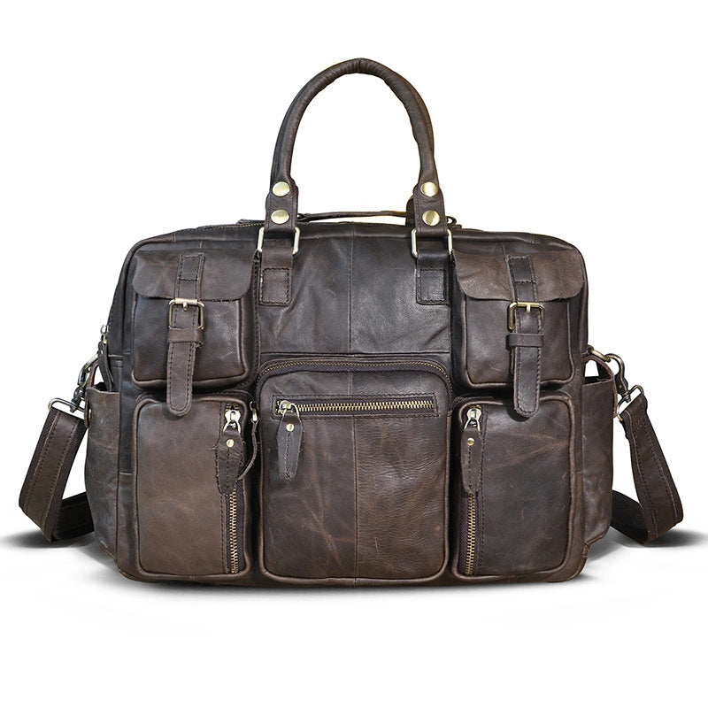 Brown leather bag with multiple pockets and straps on a white background
