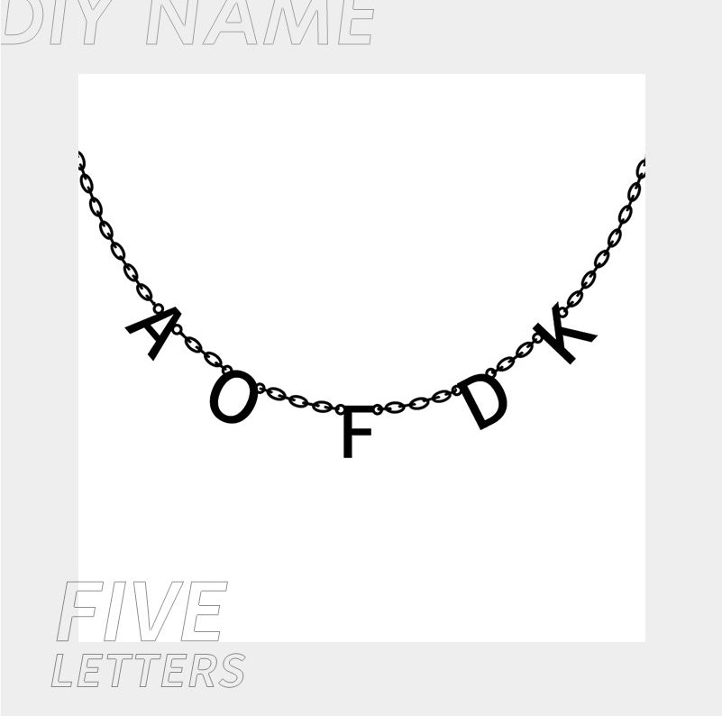 Necklace with black letter pendants on a white background