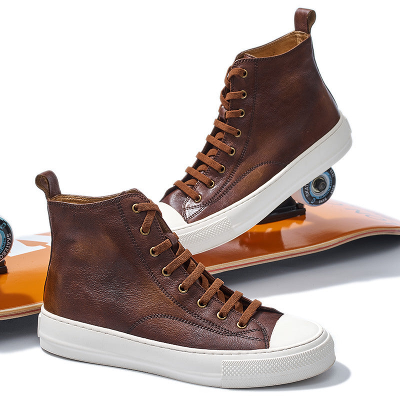 Brown high-top sneakers with white soles on a white background