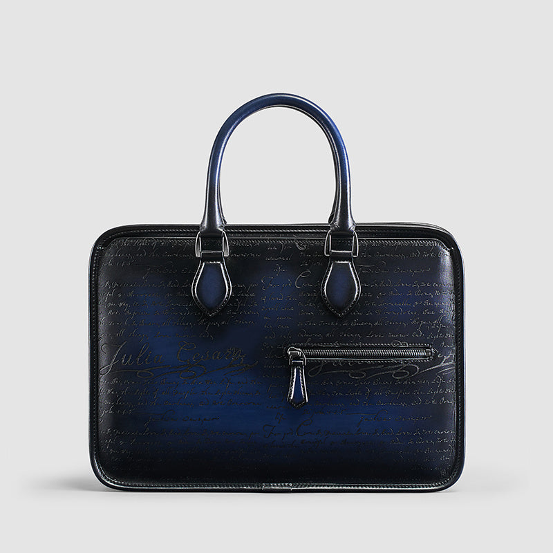 Black leather briefcase with blue gradient on a light gray background