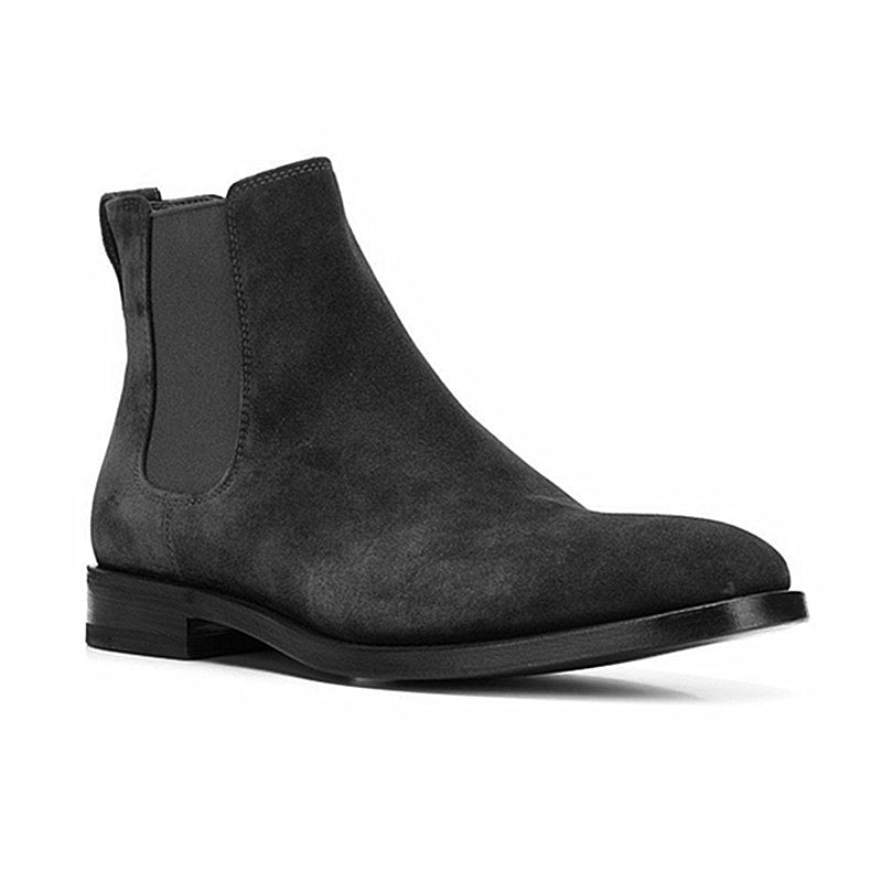 Dark gray suede Chelsea boot on a white background