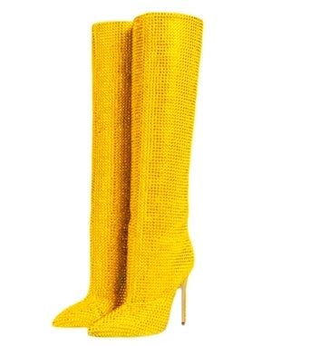 Yellow knee-high boots on a white background