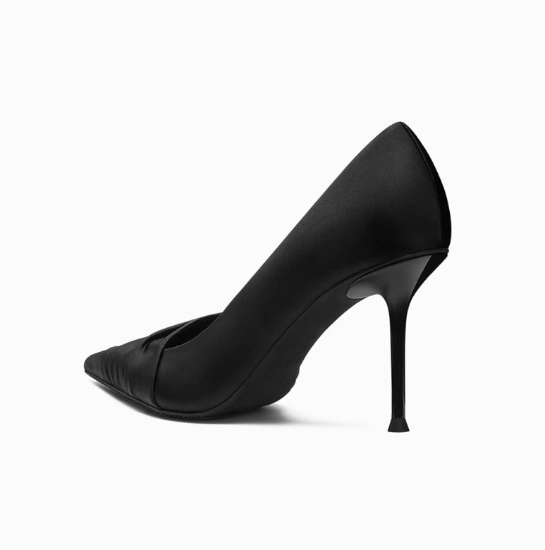 Black high-heeled shoe on a white background