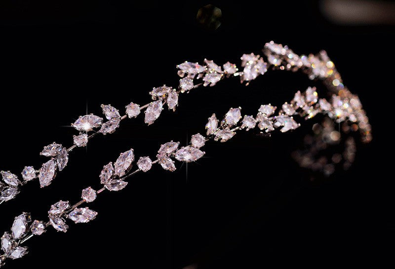 Sparkling diamond tiara on a dark background