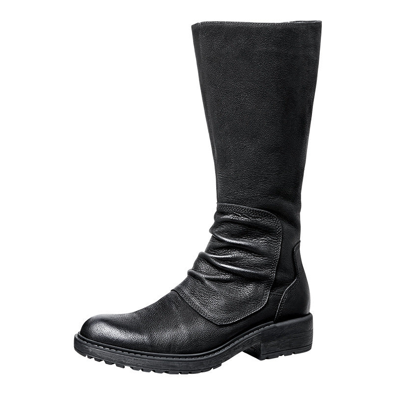 Black knee-high boot on a white background