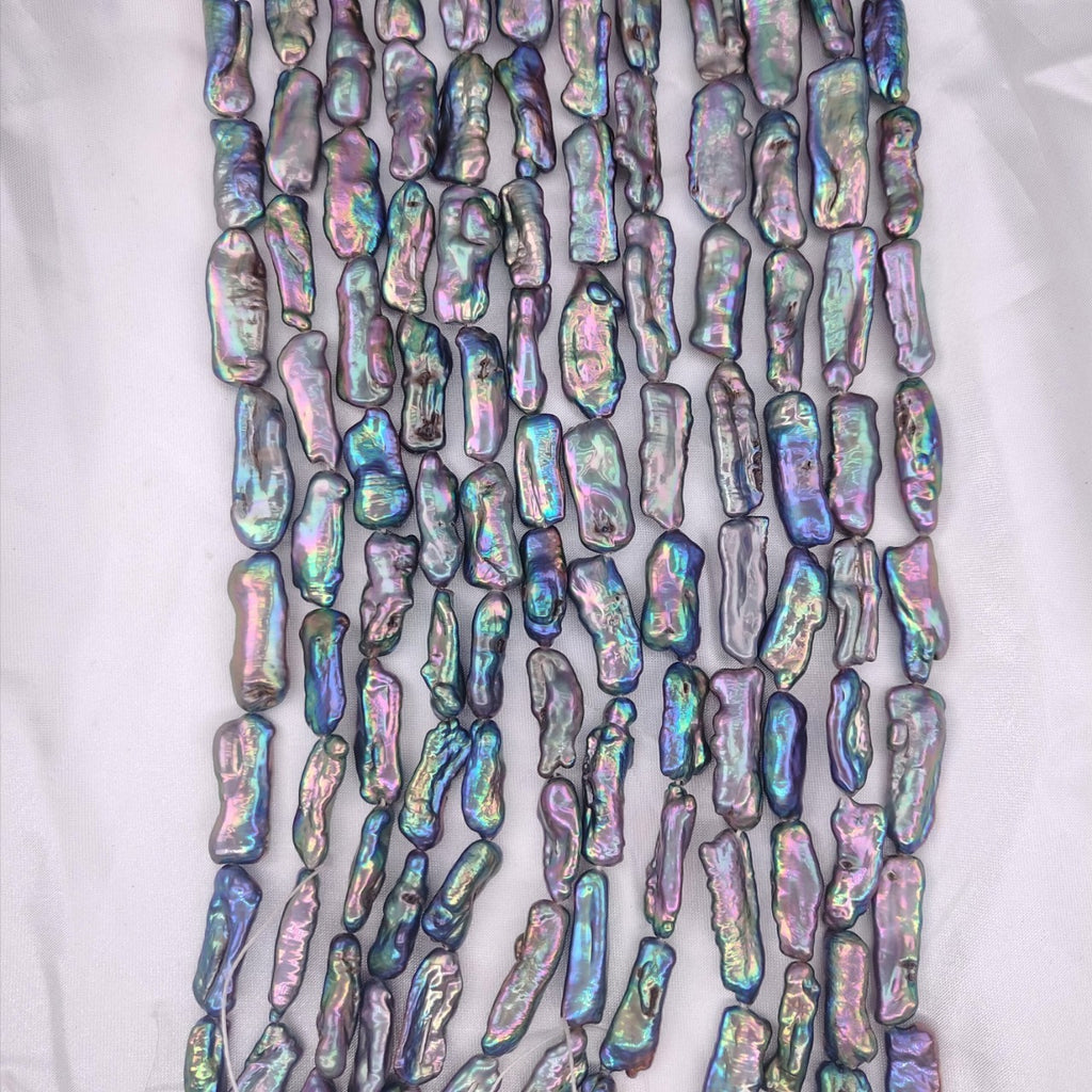 Multicolored iridescent beads on a white background