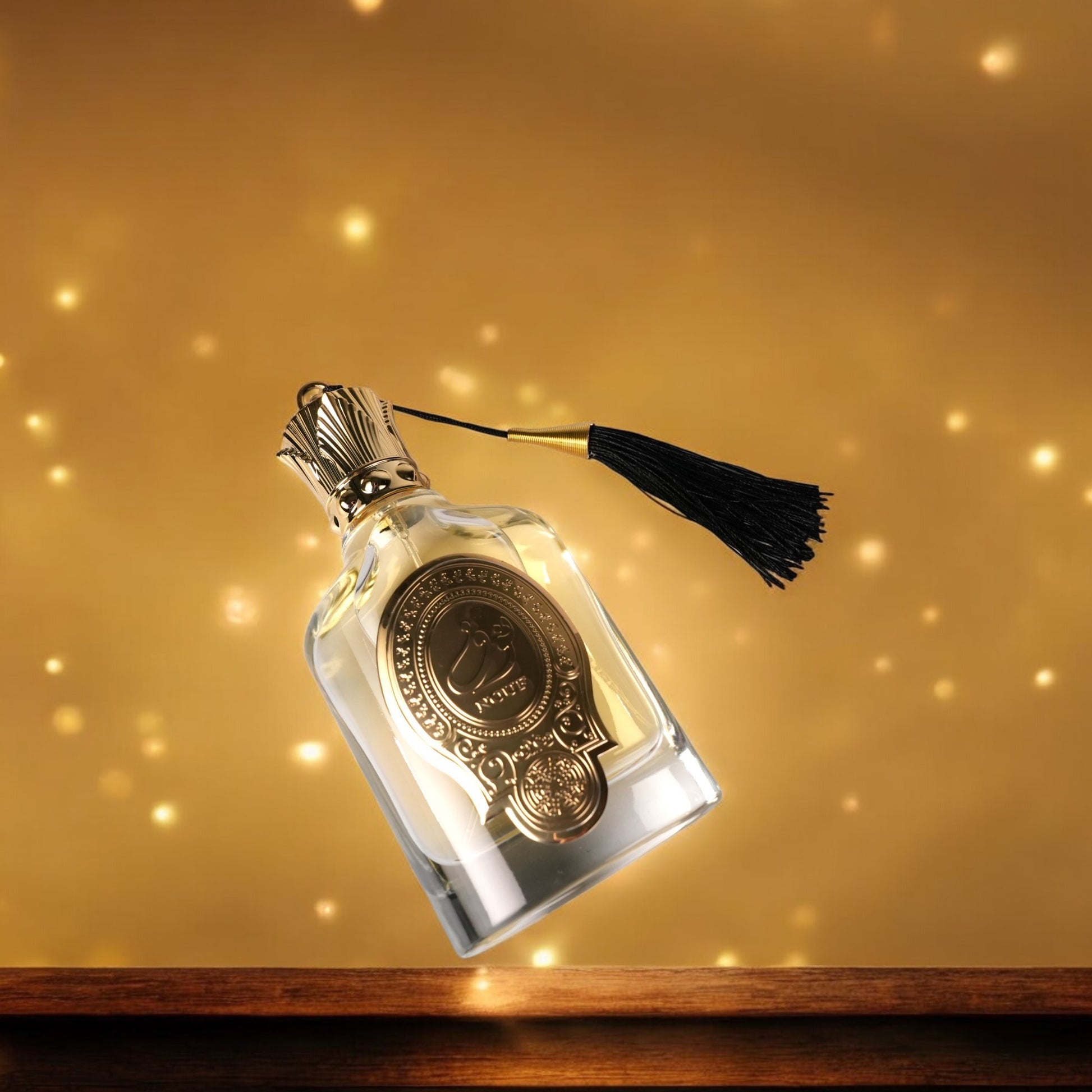 Decorative bottle with a tassel on a gold background