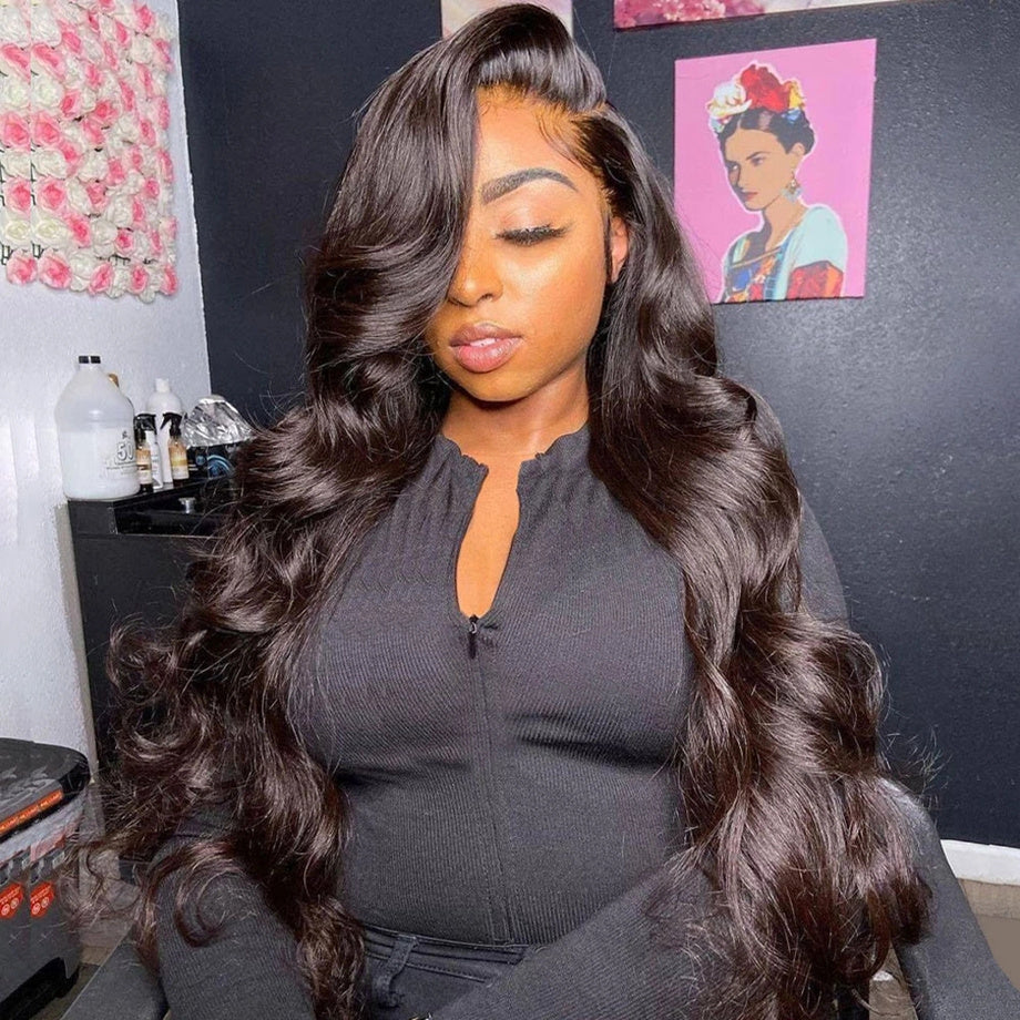 13x4 Body Wave Lace Front Wig worn by woman with natural black, full, thick, pre plucked hair and side parting